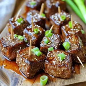 - 1 lb sirloin steak, cut into bite-sized cubes - 1/4 cup honey - 1/4 cup soy sauce - 4 cloves garlic, minced - 1 tablespoon fresh ginger, grated - 2 tablespoons olive oil - 1 teaspoon black pepper - 1 teaspoon sesame seeds (for garnish) - 2 green onions, sliced (for garnish) - Large skillet - Medium bowl The main ingredients for honey garlic steak bites make the dish tasty and simple. Sirloin steak gives a nice, tender bite. Honey adds a sweet touch that balances the salty soy sauce. Garlic and ginger bring bold flavors that make each bite pop. For seasoning, black pepper adds a hint of spice. Sesame seeds and green onions make the dish look nice and add crunch. You only need a large skillet to cook the steak bites. A medium bowl helps mix the marinade well. This setup makes the cooking process smooth and easy. If you want to try this dish, check the full recipe for all the steps and tips! - Combine honey, soy sauce, garlic, ginger, and pepper in a medium bowl. - Whisk until well mixed. This simple mix gives the steak its sweet and savory flavor. - Coat the steak cubes in the marinade. Make sure all sides are covered. - For the best taste, marinate for 30 minutes to 2 hours. The longer, the better! - Heat olive oil in a large skillet over medium-high heat. Wait until the oil is hot but not smoking. - Remove the steak from the marinade, shaking off any extra. Save the marinade for later. - Add the steak bites in a single layer. You may need to do this in batches. - Sear for about 2-3 minutes on each side. Look for a nice brown color. - Once cooked, pour the reserved marinade over the steak bites. Let it simmer for about 2 more minutes. This makes a tasty sauce that coats the bites. - Remove from heat and transfer to a serving platter. Sprinkle with sesame seeds and sliced green onions for a bright finish. For the full recipe, check [Full Recipe]. For steak, doneness matters. Here’s a simple guide: - Rare: 125°F - Medium Rare: 135°F - Medium: 145°F - Medium Well: 150°F - Well Done: 160°F Use a meat thermometer for best results. It helps you avoid overcooking. Let the steak rest after cooking. This step is key. Resting for 5 to 10 minutes keeps the juices inside. A juicy steak is always better! Presentation is fun! Try this: Serve the honey garlic steak bites on a wooden board. Drizzle extra sauce on top for flair. Use toothpicks for easy eating. Pair these bites with sides like rice, salad, or roasted veggies. They also go well with sweet drinks like iced tea or lemonade. Maximize marinade flavor for a tasty dish. Marinate the steak for at least 30 minutes. Longer marinating, up to 2 hours, makes a big difference. If you have extra marinade, store it. Keep it in a sealed container in the fridge. Use it within a week to keep it fresh. You can also use it as a sauce later! For the full recipe, check out the detailed steps provided. Enjoy your cooking! {{image_2}} You can use cuts other than sirloin for your steak bites. Ribeye offers great marbling and flavor. Flank steak is leaner but still tender when cooked right. Always slice against the grain for the best texture. If you choose a tougher cut, marinate longer. This helps break down the fibers. Try using a meat mallet to tenderize before marinating. Mixing in vegetables can enhance your dish. Bell peppers add color and crunch. Broccoli florets offer a nice bite and soak up the sauce. Snap peas or zucchini are also great options. Cook veggies for about 3-5 minutes before adding steak. This helps keep them crisp and fresh. Add them to the skillet after searing your steak bites. Switching sauces can change the flavor profile. BBQ sauce gives a smoky touch. Teriyaki sauce adds sweetness and umami. Experiment with sweeteners like maple syrup or agave. Adjust the amount based on your taste. Each sauce brings a unique twist to the dish. Enjoy the freedom to mix and match! For the full recipe, don't forget to check out the detailed steps above. To keep your honey garlic steak bites fresh, place them in an airtight container. This helps prevent air from making them dry. You can store them in the fridge for up to three days. If you have a lot of leftovers, try dividing them into smaller containers. This makes it easy to heat up just what you need. When you want to enjoy your steak bites again, avoid using high heat. The best way to reheat them is in a skillet over low heat. This keeps them juicy. Stir them often to ensure they warm evenly. You can also use a microwave, but be careful. Heat them in short bursts of 30 seconds to avoid overcooking. If you want to save your steak bites for later, freezing works well. First, let them cool completely. Then, place them in a freezer-safe bag or container. Be sure to remove as much air as possible. They can stay frozen for up to three months. When you’re ready to eat them, thaw them in the fridge overnight. For quick thawing, you can use the microwave. Just remember to reheat them gently for the best flavor. For more details, check out the Full Recipe. To reduce the sweetness, use less honey. Start with two tablespoons instead of a fourth cup. You can also add more soy sauce. This gives a savory taste that balances the honey. Try adding a splash of vinegar, too. It adds a tangy twist that cuts the sweetness. Yes, you can! Chicken works well, but it needs longer cooking. Cut the chicken into small pieces. Cook until they reach an internal temperature of 165°F. Tofu is a great option for a meatless dish. Press the tofu to remove excess water, then cube it. Sear it in the skillet until golden. Adjust the cooking time to avoid overcooking. These steak bites taste great with rice. Try serving them over jasmine or brown rice. Steamed broccoli or green beans add color and nutrients. A fresh garden salad also complements the dish well. You can also serve garlic bread for a tasty twist. You can marinate the steak for 30 minutes to 2 hours. If you want more flavor, go for the full 2 hours. Just don’t let it sit too long, or the meat can become mushy. Always keep it in the fridge while marinating for safety. This way, the flavors will soak in and make the steak bites amazing! For the full recipe, check out the details above. In this post, I covered how to make honey garlic steak bites using key ingredients like sirloin, honey, soy sauce, and fresh garlic and ginger. I shared step-by-step instructions from marinating the steak to cooking it perfectly. You learned tips for serving and flavor variations, plus how to store leftovers. These bites are tasty and easy to make, perfect for any occasion. Enjoy experimenting with flavors and sharing this delicious dish with others. Now, get cooking and savor every bite!
