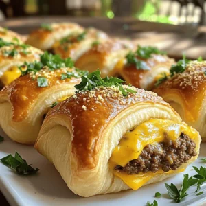 - 1 lb ground beef - 1 cup shredded cheddar cheese - 1/2 cup grated Parmesan cheese - 1 clove garlic, minced - 1 teaspoon onion powder - 1 teaspoon Worcestershire sauce - 1 package (8 oz) refrigerated crescent dough - 1 tablespoon chopped fresh parsley (for garnish) - Salt and pepper to taste - 1 tablespoon butter, melted - 1 tablespoon garlic powder - 1/2 teaspoon Italian seasoning For these Garlic Parmesan Cheeseburger Bombs, you need some key ingredients. Start with fresh ground beef for a juicy bite. The cheese is vital; use both cheddar and Parmesan for great taste. Minced garlic adds a punch of flavor, while onion powder gives a nice depth. Worcestershire sauce brings umami to the mix. You'll also need crescent dough to wrap all the goodness inside. Don’t forget salt and pepper to enhance the flavors. For a final touch, we’ll add some melted butter mixed with garlic powder and Italian seasoning. It makes the bombs golden and tasty. You can serve these bombs warm, garnished with parsley. They pair well with a fresh salad or crispy fries. For the complete method and tips, check the Full Recipe. 1. Preheat your oven to 375°F (190°C). This step is key for even cooking. 2. Prepare your baking sheet by greasing it lightly. This helps the bombs not stick. 3. In a large mixing bowl, combine the ground beef, minced garlic, onion powder, Worcestershire sauce, salt, and pepper. Mix well until everything blends. 4. Form small patties with the beef mixture. Each patty should be about the size of a tablespoon. This size cooks quickly. 5. Cook the patties in a skillet over medium heat for about 2-3 minutes on each side. They should brown but not fully cook. Remove them from heat and set aside. 6. Now, unroll the crescent dough on a clean surface and separate it into triangles. Each triangle will hold a tasty surprise. 1. Assemble the cheeseburger bombs. Place a spoonful of shredded cheddar cheese at the center of each triangle. 2. Add a beef patty on top of the cheese. Then sprinkle a bit more cheddar and some grated Parmesan on top. 3. Fold the dough over the filling, pinching the edges to seal them completely. Make sure there are no openings. 4. Place the sealed bombs on your greased baking sheet. 5. In a small bowl, mix melted butter, garlic powder, and Italian seasoning. Brush this mixture over the tops of each bomb. This adds flavor and helps them brown. 6. Bake in the preheated oven for 12-15 minutes. They should turn golden brown and smell amazing. 7. Once done, remove them from the oven and let them cool for a few minutes. Serve warm and garnish with chopped parsley if you like. You can find the full recipe [here](#). Enjoy your delicious Garlic Parmesan Cheeseburger Bombs! - Ensuring flavor balance with seasonings: Use the right amount of salt and pepper. This enhances the beef and cheese flavors. Adding garlic and onion powder gives the bombs extra depth. Taste your beef mix before cooking. Adjust as needed. - Preventing leaking of the filling during baking: Seal the dough tightly around the filling. Press the edges well after folding. If you spot any holes, pinch them closed. This stops the cheese and beef from leaking out. - Recommended temperature and timing adjustments: Bake at 375°F (190°C) for 12-15 minutes. Keep an eye on them to avoid burning. If you want a crispier top, increase the oven temperature for the last few minutes. - Best sides to serve with cheeseburger bombs: Serve with fresh salad or crispy fries. They add color and crunch. You can also try a side of pickles for a tangy touch. - Presentation ideas for an appealing dish: Arrange the bombs on a large platter. You can stack them for a fun look. Use parchment paper to add a rustic feel. - Garnishing techniques using fresh herbs: Top the bombs with chopped parsley right before serving. This adds a pop of color and freshness. You can also try chives or basil for a different taste. {{image_2}} You can switch up the cheese in this recipe. Try using mozzarella or gouda for a different taste. For proteins, ground turkey or chicken work well too. If you want to make it vegetarian, use black beans or lentils instead of beef. You can also add mushrooms for extra flavor. Seasonings can change the whole dish. Try adding smoked paprika for a hint of smokiness. Or, use cumin for a warm touch. Each change can make your bombs unique and tasty. To change the flavor, think about adding new ingredients. Chopped jalapeños can add a spicy kick. Or, mix in some diced pickles for a tangy twist. For a fun international flair, add taco seasoning for a Mexican vibe. Experiment with sauces too! A drizzle of sriracha or BBQ sauce can take these bombs to the next level. You could also try a garlic aioli for a creamy touch. Each sauce gives a fresh angle to this classic treat. For the full recipe, check out the details above and enjoy making these fun bombs! To store leftover Garlic Parmesan Cheeseburger Bombs, let them cool first. Place them in an airtight container. They will stay fresh in the fridge for up to three days. For longer storage, you can freeze them. Wrap each bomb in plastic wrap and place them in a freezer bag. They can last up to three months in the freezer. When you want to reheat them, the oven works best. Preheat your oven to 350°F (175°C). Place the bombs on a baking sheet and cover them with foil. Heat for about 15-20 minutes. This helps keep them moist and warm throughout. You can also use a microwave, but they might not stay crispy. To enjoy leftover bombs, it’s best to heat them as mentioned above. You can also slice them in half and serve with dipping sauces. This adds fun and flavor. When storing food, always check for signs of spoilage. If they smell bad or look strange, it’s safer to throw them away. Enjoy your tasty treats without worries! What are Garlic Parmesan Cheeseburger Bombs? Garlic Parmesan Cheeseburger Bombs are tasty bites. They combine ground beef with cheese, garlic, and spices. Wrapped in soft crescent dough, they are baked until golden. These bombs are perfect for parties or a fun snack. Can I prepare the bombs ahead of time? Yes, you can make these bombs ahead. Prepare the filling and wrap them in dough. Store them in the fridge for up to 24 hours. When ready, bake them as usual. This saves time and makes serving easy. How do I know if they are cooked properly? To check if they are cooked, look for a golden brown color. You can also use a meat thermometer. The internal temperature should reach 160°F (71°C) for the beef to be safe. Let them cool a bit before taking a bite. What sides pair well with this dish? Many sides go well with these bombs. You can serve them with a fresh salad or crispy fries. Veggie sticks with dip also make a great choice. Try pairing with a tangy dipping sauce for extra flavor. Are there nut-free or gluten-free options available? Yes, you can make these bombs nut-free easily. For gluten-free, use gluten-free crescent dough. Check labels to ensure all ingredients are safe. This way, everyone can enjoy this tasty treat. How to make Garlic Parmesan Cheeseburger Bombs spicier? To add spice, mix in some hot sauce or cayenne pepper. You can also use pepper jack cheese for heat. Adding jalapeños or crushed red pepper flakes works too. Adjust the spice to fit your taste. In this post, we explored the tasty Garlic Parmesan Cheeseburger Bombs. You learned about the key ingredients, prep steps, and cooking methods. I shared tips to make your dish even better and offered some fun variations to try. Remember, these bombs are easy to customize and perfect for sharing. Use the storage tips to keep leftovers fresh. Have fun experimenting with flavors and serving ideas. Try these bombs for your next meal, and enjoy every bite!