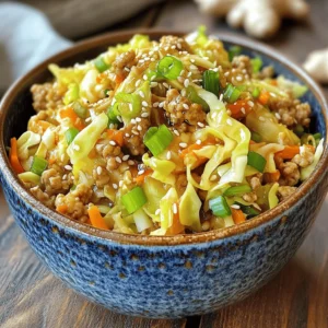 - Ground chicken or turkey - Coleslaw mix (shredded cabbage and carrots) - Green onions, garlic, and ginger The main ingredients make this dish shine. Ground chicken or turkey gives it protein and flavor. I love using coleslaw mix. It adds crunch and color to the bowl. The mix of shredded cabbage and carrots is quick to use. Next, we have green onions, garlic, and ginger. These aromatics bring a fragrant kick to the dish. - Low-sodium soy sauce - Sesame oil and olive oil - Rice vinegar For the condiments and oils, low-sodium soy sauce is my go-to. It adds saltiness without being too strong. Sesame oil brings a nutty flavor. I like to mix it with olive oil for cooking. Rice vinegar adds a touch of tang. This combination creates a balanced taste that makes every bite enjoyable. - Salt and pepper - Sesame seeds for garnish Seasoning is key to a great dish. I always use salt and pepper to enhance the flavors. They help bring out the best in all the ingredients. Finally, I sprinkle sesame seeds on top. They add a nice crunch and look great on the dish. For the full recipe, check out the details above. To start, heat your oils in a large skillet or wok on medium heat. I prefer to use both olive oil and sesame oil for a rich flavor. The right skillet is key; a non-stick or well-seasoned cast iron works best. This ensures even cooking and easy cleanup. Next, add the ground chicken or turkey to the hot skillet. Cook it until it turns brown, which takes about 5 to 7 minutes. Break up the meat with a spatula as it cooks. This helps it brown evenly. Don't forget to season it with salt and pepper for maximum flavor. Proper seasoning makes a big difference in taste. Once the meat is cooked, it’s time for the aromatics. Stir in minced garlic and ginger. Cook them for about 1 minute until they smell great. Then, add the coleslaw mix into the skillet. Stir it until the cabbage wilts, which should take about 3 to 4 minutes. This gives your dish that classic egg roll taste while keeping it healthy. For the complete cooking instructions, refer to the Full Recipe. Adjust seasonings to your taste. If you like it spicy, add chili flakes. You can also use more garlic or ginger for a stronger punch. Taste as you go for the best results. To enhance flavor, try adding a splash of lime juice. This brightens the dish. You can also mix in a bit of hoisin sauce for a sweet touch. For even cooking, use a large skillet or wok. This helps distribute heat. Stir often to ensure nothing sticks and cooks evenly. To avoid soggy vegetables, cook the coleslaw mix quickly. Stir-fry it for just a few minutes. You want it tender but still crisp. Serve in wide bowls for a nice look. This gives you space to show off the colorful mix. For garnishing, sprinkle sesame seeds on top. They add crunch and style. You can also add chopped cilantro or sliced radishes for extra color. These small touches make your dish pop! {{image_2}} You can switch the ground chicken or turkey for ground beef. This change adds a rich flavor. If you prefer plant-based options, use lentils or tofu instead. Both options are tasty and filling. For vegetarians, skip meat entirely. For vegans, ensure the sauces are plant-based. Add more veggies to your dish for extra color and taste. Bell peppers, zucchini, or mushrooms work well. You can also toss in snap peas or broccoli for crunch. Adjust cooking times for these vegetables. Softer veggies, like mushrooms, need less time than crunchy ones like bell peppers. Make your egg roll in a bowl unique by adding different sauces or spices. Try sweet chili sauce for a touch of sweetness. You can also add curry powder for a warm flavor. For an Asian-inspired twist, use hoisin sauce or sriracha for heat. Each of these options brings a new twist to a classic dish. To store leftovers from your egg roll in a bowl, let it cool first. Place the dish in an airtight container. This keeps it fresh and tasty. You can store it in the fridge for up to four days. If you have a lot, consider portioning it out. This way, you can grab a quick meal when you need it. If you want to freeze your egg roll in a bowl, use freezer-safe bags or containers. Be sure to remove as much air as possible. This helps prevent freezer burn. You can keep it in the freezer for up to three months. When you're ready to eat, thaw it in the fridge overnight. To reheat, I recommend using the stovetop. This method keeps the dish from getting soggy. Heat it on medium until warmed through. If you use a microwave, put it in a bowl and cover it. Microwave in short bursts, stirring in between. This helps heat it evenly. Enjoy your meal just like it was fresh! Egg Roll in a Bowl is a quick and tasty dish. It has all the flavors of an egg roll but skips the wrapper. You get ground meat, veggies, and savory sauce in a bowl. It is easy to make and fun to eat. You can enjoy it as a main meal or a side. Yes, you can make Egg Roll in a Bowl ahead of time. Cook it, then store it in the fridge. It will stay fresh for up to three days. Just reheat it when you are ready to eat. This makes it great for meal prep. Egg Roll in a Bowl can be gluten-free. Use gluten-free soy sauce instead of regular soy sauce. Make sure to check the labels on all your ingredients. This way, you can enjoy the dish without gluten. To spice up Egg Roll in a Bowl, add red pepper flakes or sriracha. You can also mix in some chopped jalapeños. Adjust the heat to fit your taste. Start with a little and add more if needed. Egg Roll in a Bowl pairs well with rice or noodles. You can also add a side of steamed veggies. For a fresh touch, serve it with a salad. Enjoy the mix of flavors and textures! For the complete recipe, check the Full Recipe section. This blog post covered how to make a tasty Egg Roll in a Bowl. We explored key ingredients like ground chicken and coleslaw. The step-by-step guide shared how to cook the meat and vegetables perfectly. I provided tips to enhance flavor and ideas for alternative ingredients. Lastly, I shared storage methods and answered common questions. Now you can enjoy this dish anytime by following the tips and variations. Keep experimenting to find your favorite flavors. This recipe is easy and fun to make!