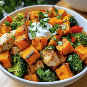 - Sweet potatoes - Chicken breast - Red bell pepper - Broccoli florets The main ingredients in this dish are bright and healthy. Sweet potatoes offer a little sweetness and lots of nutrients. Chicken breast adds protein, making the meal filling. Red bell pepper brings crunch and color, while broccoli florets add fiber and vitamins. These ingredients work well together, creating a balance of flavors and textures. - Olive oil - Paprika - Garlic powder - Cumin - Salt and pepper The seasonings make this meal pop! Olive oil helps cook the ingredients and adds richness. Paprika gives a warm, smoky taste. Garlic powder adds depth, while cumin brings an earthy note. Salt and pepper enhance all the flavors. Together, these seasonings create a savory mix that makes every bite enjoyable. - Greek yogurt - Fresh parsley Toppings make your bowls special. Greek yogurt adds creaminess and a tangy flavor. It also boosts protein. Fresh parsley adds a pop of green and a fresh taste. These toppings not only look good but also add great flavor. You can find the full recipe above to guide you through making these tasty bowls! First, you want to cube the sweet potatoes. Start by peeling them, then cut them into small cubes. This helps them cook evenly. Place the cubes in a large bowl. Next, toss the sweet potatoes with seasonings. Use 1 tablespoon of olive oil, paprika, garlic powder, cumin, salt, and pepper. Mix well so that each piece is coated. Now, spread the sweet potatoes on a baking sheet in a single layer. Roast them in a preheated oven at 400°F (200°C). Bake for about 20 minutes. Stir halfway through to ensure they roast evenly. The sweet potatoes should be tender and slightly caramelized when done. While the sweet potatoes roast, heat a skillet over medium heat and add 1 tablespoon of olive oil. Let it heat up for a moment. Now, add the diced chicken to the skillet. Season the chicken with salt and pepper. Cook for about 5-7 minutes, stirring often. The chicken should turn golden brown and cook through. Once the chicken is ready, add the sliced red bell pepper and broccoli florets to the skillet. Stir-fry these vegetables with the chicken for another 5-6 minutes. You want them to be tender but still crisp. Once everything is cooked, it’s time to assemble your bowls. Start by placing a scoop of the roasted sweet potatoes at the bottom of each bowl. Next, add the chicken and vegetable mixture on top of the sweet potatoes. For a tasty finish, serve each bowl with a dollop of Greek yogurt. This adds creaminess and flavor. To make it look nice, sprinkle fresh parsley on top for garnish. You can find the full recipe for this delicious dish above. Enjoy your healthy meal! - Ensuring chicken is tender: Use a meat thermometer. Cook chicken to 165°F for safety. Don’t overcook; this keeps it juicy. Let it rest for a few minutes after cooking to lock in moisture. - Tips for perfectly roasted sweet potatoes: Cut sweet potatoes into even cubes. This ensures they cook evenly. Toss them well with oil and spices. Spread them out on the baking sheet to avoid steaming. Stir halfway through roasting for nice caramelization. - Best practices for stir-frying vegetables: Heat your pan before adding oil. This prevents sticking. Add veggies in batches to avoid crowding. Cook on high heat for a short time. This keeps them crisp and colorful. - Arranging bowls for visual appeal: Start with the base of sweet potatoes. Add chicken and vegetables in sections. This creates a beautiful layered look. - Garnishing effectively: Use a dollop of Greek yogurt for creaminess. Sprinkle fresh parsley for color and flavor. You can also add a squeeze of lemon for brightness. - Using colorful ingredients: Bright vegetables like red bell peppers and green broccoli add color. This makes your meal more inviting. Mix different hues to catch the eye and enhance flavor. {{image_2}} You can switch up the proteins if you want. Instead of chicken, try turkey or tofu. Both options work well and add different flavors. Feel free to mix in different vegetables too. Zucchini, carrots, or even spinach can brighten the bowl. Each veggie brings its own taste and texture. For seasonings, get creative! Swap paprika for chili powder for a kick. Or use Italian herbs for a fresh twist. The key is to match flavors you love. If you need a gluten-free meal, choose gluten-free soy sauce or skip the soy sauce altogether. This dish can easily fit into a gluten-free diet. Want a vegetarian version? Use chickpeas or black beans instead of chicken. They add protein and work well with sweet potatoes. For low-carb options, skip the sweet potatoes and use cauliflower rice instead. It’s a great swap and keeps the meal light. Pair these bowls with a simple green salad. A fresh side adds crunch and balance to your meal. If you like meal prep, these bowls store well. You can make a big batch for quick lunches. Just keep the yogurt and parsley separate until you serve. These bowls are perfect for lunch or dinner. They are filling and flavorful, making them an excellent choice for any time of day. For the full recipe, check out the complete guide. To keep your Chicken and Sweet Potato Bowls fresh, follow these tips: - Refrigerating: Place leftovers in an airtight container. This keeps them moist and tasty. Store in the fridge for up to four days. - Freezing: For longer storage, freeze the bowls. Use freezer-safe containers or bags. This helps keep the flavors intact. They can last up to three months in the freezer. - Reheating: When ready to eat, thaw overnight in the fridge if frozen. Heat in the microwave or oven until warm. Stir to ensure even heating. How long do these bowls last? In the fridge, they last about four days. If you see any signs of spoilage, like off smells or mold, it’s best to throw them away. Always trust your senses. Keeping food safe is key. For more details, check the Full Recipe. This blog post explored sweet potato and chicken bowls. We covered key ingredients, cooking steps, and ways to make your dish shine. You learned useful tips to cook chicken right, roast potatoes, and present your meal beautifully. With various variations and storage info, you can customize these bowls to fit any diet. Whether spicy, gluten-free, or vegetarian, these bowls suit everyone’s taste. Now, it’s your turn to get creative in the kitchen and whip up this easy, yummy dish. Enjoy your flavorful journey!