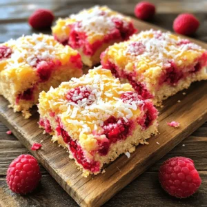 - 1 cup almond flour - 1 cup shredded unsweetened coconut - 1/2 cup honey or maple syrup - 1/4 cup coconut oil, melted - 2 cups fresh raspberries - 1 teaspoon vanilla extract - 1/4 teaspoon salt - 1/4 teaspoon baking powder - Optional: 1/4 cup chopped nuts for added crunch - Coconut flour vs. almond flour: Coconut flour absorbs more liquid. Use less if you switch. - Alternative sweeteners: You can use agave or stevia for a different taste. - Dairy-free options: For coconut oil, you can use another plant oil like avocado oil. - Fresh vs. frozen raspberries: Fresh raspberries taste better. They stay firm when baked. Frozen raspberries can be used but might make the squares soggier. - Ensuring quality of coconut products: Look for organic or non-GMO labels. Fresh, high-quality coconut products enhance the flavor and texture of your squares. 1. First, preheat your oven to 350°F (175°C). Line an 8x8 inch baking pan with parchment paper. Leave some paper over the edges. This helps with easy removal later. 2. In a mixing bowl, combine 1 cup of almond flour, 1 cup of shredded coconut, 1/4 teaspoon of salt, and 1/4 teaspoon of baking powder. Mix these dry ingredients well. 3. In another bowl, whisk together 1/4 cup of melted coconut oil, 1/2 cup of honey or maple syrup, and 1 teaspoon of vanilla extract. Make sure it’s smooth. 1. Press the dough evenly into the lined baking pan. This forms the base layer for your squares. 2. Now, evenly distribute 2 cups of fresh raspberries on top of the base layer. Gently press some raspberries into the dough. 1. Bake your squares in the preheated oven for 25-30 minutes. Look for golden brown edges and bubbling raspberries. 2. Once baked, remove the pan from the oven. Let it cool for about 15 minutes in the pan. Then, lift the parchment paper to remove the squares. Cool them fully on a wire rack. These steps make it easy to create Raspberry Coconut Squares. Follow along to enjoy a tasty treat! For the complete recipe, check the Full Recipe section. To get a crumbly yet cohesive base, use almond flour. It binds well with coconut. Mix the dry ingredients thoroughly before adding wet ones. This helps the squares hold together. To avoid sogginess, bake at 350°F for 25-30 minutes. Check for golden edges and bubbling raspberries. If they look too wet, bake a few minutes longer. This ensures a nice, firm texture. Add spices like cinnamon or nutmeg for extra taste. Just a little can make a big difference. Choose pure vanilla extract over imitation. It gives a richer flavor to your squares. For serving, cut the squares into neat pieces. You can dust them with powdered sugar for a nice look. Garnish with fresh raspberries or mint leaves for color. Pair these squares with a cup of tea or coffee. They also go well with a scoop of vanilla ice cream. Enjoy sharing them with friends! {{image_2}} You can spice up your Raspberry Coconut Squares. Try swapping raspberries with blueberries or strawberries. Each berry brings a new taste and color. You can also mix different berries for a fruity blend. It adds fun and excitement to your squares. Another great idea is to add citrus zest. Lemon or lime zest gives a bright and fresh flavor. Just a little bit can change everything. It wakes up the taste and makes every bite special. If you need a gluten-free option, almond flour works great. It gives the same texture without gluten. Make sure to check the labels to avoid any hidden gluten. For those who follow a vegan diet, honey is easy to replace. Use maple syrup instead to keep it sweet. You can also try agave nectar. It keeps the squares moist and delicious while being fully plant-based. In summer, you can use fresh fruits that are in season. Consider peaches or cherries for a juicy twist. They blend well with the coconut and create a great flavor. During the holiday season, try adding spices like nutmeg or cinnamon. These spices can make your squares feel festive. You can even drizzle some dark chocolate on top for a special touch. Each season brings its own flavors, making your squares exciting all year long. For the complete recipe, check the [Full Recipe]. To keep your Raspberry Coconut Squares fresh, use airtight containers. Glass or plastic containers work well. Avoid leaving them out at room temperature for long. If you plan to enjoy them within a few days, room temperature is fine. For longer storage, refrigeration keeps them fresh and tasty. Freezing these squares is easy! First, cut them into squares. Place them in a single layer on a baking sheet. Freeze them for about an hour. After that, move them to a freezer-safe bag. They can stay in the freezer for up to three months. When you want to eat them, just take them out and let them thaw at room temperature. Raspberry Coconut Squares stay fresh for about five days in the fridge. After that, they may lose taste and texture. Look for signs of spoilage like mold or an off smell. If they feel dry or hard, it’s time to toss them. For best results, enjoy them while they’re fresh! Raspberry Coconut Squares last about 4 to 5 days when stored properly. Keep them in an airtight container at room temperature. If you want them to last longer, you can refrigerate them for up to a week. Remember, storing them in the fridge may change their texture slightly, making them a bit firmer. Yes, you can use frozen raspberries. However, they may change the texture. Frozen fruits release more juice as they bake. This can make your squares a bit wetter. If you use frozen raspberries, try to thaw and drain them before adding them to the mix. This helps keep the squares from getting too soggy. You can serve Raspberry Coconut Squares with various treats. A scoop of vanilla ice cream pairs great with them. Whipped cream or yogurt can also enhance the flavor. For a refreshing twist, try serving them with fresh mint leaves. They also work well with a warm cup of tea or coffee. Yes, Raspberry Coconut Squares can be a healthy treat. They contain almond flour, which is high in protein and healthy fats. Unsweetened coconut adds fiber and essential minerals. Raspberries are rich in vitamins and antioxidants. Using honey or maple syrup provides natural sweetness without refined sugar. Overall, they make a nutritious snack or dessert option. Raspberry Coconut Squares are simple to make and full of flavor. We covered the key ingredients, step-by-step instructions, and handy tips. You can modify them to fit your taste, whether adding different berries or adjusting for dietary needs. Store them well to keep them fresh. These squares are a tasty treat, perfect for any occasion. Try them out and enjoy the wholesome goodness they bring to your table!