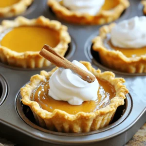For this recipe, pumpkin puree is key. It gives the pie cups their rich flavor. You can use canned pumpkin puree or make your own. If you choose to make your own, bake or steam fresh pumpkin. Then, blend it until smooth. Pair the puree with sweeteners. I use sweetened condensed milk for creaminess. Brown sugar adds a nice depth of flavor. Together, they create a sweet and smooth filling. Spices make your mini pumpkin pie cups special. Ground cinnamon is a must. It brings warmth and comfort. Nutmeg adds a hint of nutty flavor. Ginger gives a little zing. Don’t forget the salt! It balances all the sweet flavors. Using these spices creates a lovely aroma as they bake. You have a couple of choices for the crust. You can buy pre-made pie crusts or make your own. If you buy them, choose a high-quality brand. For homemade crust, use flour, butter, and a bit of water. Roll it out thin for a flaky texture. Press the dough into a mini muffin tin to form the cups. This step is fun and easy. You can shape them however you like. Each option leads to tasty mini pumpkin pie cups. First, turn on your oven. Set it to 375°F (190°C). This helps your mini pumpkin pie cups bake evenly. Now, let’s get the pie crust ready. Take the pre-made pie crusts out of the package. Roll them out on a floured surface. Use a round cookie cutter or a cup to cut circles. Each circle should fit into the mini muffin tin. Press the dough circles into the muffin cups to form your mini pie shells. Next, it’s time to make the filling. In a mixing bowl, add these ingredients: - 1 cup pumpkin puree - 1/2 cup sweetened condensed milk - 1/4 cup brown sugar - 1 teaspoon ground cinnamon - 1/2 teaspoon ground nutmeg - 1/4 teaspoon ground ginger - 1/4 teaspoon salt - 1 large egg Whisk these together until smooth. Make sure there are no lumps in your mixture. Now, carefully pour the pumpkin filling into each mini pie shell. Fill them about 3/4 full. This allows room for the filling to rise while baking. Place the muffin tin in your preheated oven. Bake for 15-20 minutes. Check if they are done by inserting a toothpick in the center. If it comes out clean, they are ready! Let them cool in the pan for 5 minutes. Then, move them to a wire rack to cool completely. Once the mini pumpkin pie cups are cool, it’s time to serve. Top each mini pie with a dollop of whipped cream. If you want, add a cinnamon stick for a nice touch. Enjoy your delightful treat! For the full recipe, check out the ingredients and steps listed earlier. To make a flaky pie crust, keep your ingredients cold. Use cold butter and cold water. This helps create layers in the dough. Be gentle while mixing. Overworking the dough can make it tough. If you use pre-made crusts, roll them out on a floured surface. Cut them into circles to fit your muffin tin. This gives a nice shape and texture. For the best pumpkin filling, use fresh pumpkin puree if you can. It tastes richer and fresher. If using canned, choose a good brand with no added sugar. Mix the pumpkin with sweetened condensed milk for creaminess. Add spices like cinnamon, nutmeg, and ginger to enhance the flavor. These spices make your mini pies warm and cozy. Blend until smooth, and remember to taste. Adjust sweetness if needed. Serve your mini pumpkin pie cups warm or chilled. Top them with whipped cream for a sweet touch. A sprinkle of cinnamon adds flavor and color. You can also use a cinnamon stick as a cute garnish. For a fun twist, try serving with caramel sauce. It gives a sweet and rich flavor that pairs well with pumpkin. Enjoy your mini pies at parties or family gatherings. They are sure to impress! For the full recipe, check the earlier section. {{image_2}} To make gluten-free mini pumpkin pie cups, use gluten-free pie crusts. You can find these in stores or make your own with gluten-free flour. The filling stays the same. Just enjoy the rich pumpkin flavor without the gluten. For a vegan version, swap the sweetened condensed milk for coconut milk or almond milk. Use a flax egg instead of a regular egg. Mix one tablespoon of ground flaxseed with three tablespoons of water. Let it sit for five minutes to thicken. For the crust, choose a vegan pie crust or make one with coconut oil instead of butter. Toppings can make your mini pumpkin pie cups even better. Try adding chopped pecans or walnuts for crunch. Shredded coconut adds a nice twist too. Drizzle maple syrup on top for a sweet touch. You can also use caramel sauce for a rich flavor. Each topping gives your mini pies a unique flair. To keep your mini pumpkin pie cups fresh, place them in an airtight container. You can store them at room temperature for one day. If you want them to last longer, refrigerate them. They will stay good in the fridge for up to four days. Make sure to cover them to keep the flavors intact. If you have more mini pumpkin pie cups than you can eat, freezing is a great option. First, let them cool completely. Then, wrap each cup in plastic wrap. Place the wrapped cups in a freezer-safe bag or container. They can last in the freezer for up to three months. When you are ready to enjoy them, just thaw them in the fridge overnight. To reheat your mini pumpkin pie cups, you can use the oven or microwave. For the oven, preheat it to 350°F (175°C). Place the cups on a baking sheet and heat for about 10 minutes. For the microwave, heat each cup for about 20-30 seconds. Keep a close eye to avoid overheating. Reheating brings back that warm, cozy taste. Enjoy them just like fresh! To make mini pumpkin pie cups from scratch, you need simple steps. Start by preheating your oven to 375°F (190°C). Roll out pre-made pie crusts on a floured surface. Cut out circles and fit them into a mini muffin tin. Next, mix pumpkin puree, sweetened condensed milk, brown sugar, and spices in a bowl. Whisk in one egg until smooth. Pour the filling into the crusts, filling them about 3/4 full. Bake for 15-20 minutes until set. Let them cool, then top with whipped cream. Yes, you can use fresh pumpkin instead of canned. First, you need to prepare the pumpkin. Cut it into pieces and remove the seeds. Bake or steam the pumpkin until tender. Once cooked, scoop out the flesh and blend it until smooth. This fresh puree adds great flavor. Remember, fresh pumpkin may have a different texture than canned. Adjust your cooking time as needed. If you need a substitute for sweetened condensed milk, you have options. You can use coconut milk with sugar, or you can mix whole milk with sugar. A common mix is to use 1 cup of milk and 1 cup of sugar, simmer until thick. You can also try mixing evaporated milk with sugar. These substitutes work well in the recipe. To check if the mini pumpkin pie cups are done, use a toothpick. Insert it into the center of a pie cup. If it comes out clean, they are ready. The filling should be set and not jiggle. You can also look for a slightly golden top. These signs mean they are baked perfectly. You learned how to make tasty mini pumpkin pie cups. We covered key ingredients like pumpkin puree, spices, and crust options. I shared a step-by-step guide for baking and cooling. You picked up tips for a flaky crust and tasty filling. We also explored variations for different diets and creative toppings. Remember to store leftovers properly. When you follow these steps, you’ll impress family and friends. Enjoy your delicious mini pies!