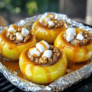 - 4 large firm apples (Honeycrisp or Granny Smith) - 1/4 cup brown sugar - 1 teaspoon ground cinnamon - 1/2 teaspoon nutmeg - 1/4 cup chopped walnuts or pecans - 1/4 cup caramel sauce - 1/4 cup mini marshmallows (optional) - 2 tablespoons butter, melted - Vanilla ice cream (for serving) To make Bloomin' Grilled Apples, you need simple yet tasty ingredients. Start with four large apples. I love using Honeycrisp or Granny Smith. They hold their shape well and taste great when grilled. Next, grab a quarter cup of brown sugar. This sweet touch adds depth. You’ll also need one teaspoon of ground cinnamon and half a teaspoon of nutmeg. These spices bring warmth to the dish. For crunch, have a quarter cup of chopped walnuts or pecans ready. They add a nice texture. You can use caramel sauce for drizzling. A quarter cup will do. If you want extra sweetness, mini marshmallows are optional. Lastly, two tablespoons of melted butter will help everything stick together. Don’t forget the vanilla ice cream for serving. It’s the perfect match for warm apples. This recipe is not only easy but also fun to prepare. You’ll enjoy every step of making this delightful dish. Check out the Full Recipe for more details. - Step 1: Preheat your grill to medium heat. This makes sure the apples cook evenly. - Step 2: Core the apples. Start from the top and leave the bottom intact. This helps create the bloom effect. - Step 3: Prepare the sugar-nut mixture. In a small bowl, mix together the brown sugar, cinnamon, nutmeg, and chopped nuts. Set this aside for stuffing later. - Step 4: Stuff the apples. Pack the sugar-nut mixture into each apple generously. Let it overflow a bit for extra flavor. - Step 5: Wrap and grill the apples. Drizzle the melted butter over each apple, then wrap them in aluminum foil. Seal the foil tightly to keep moisture in. Place the wrapped apples on the grill and cook for 20-25 minutes, turning them occasionally. - Step 6: Add marshmallows and caramel sauce. In the last few minutes of grilling, carefully unwrap the foil. Sprinkle mini marshmallows on top if you want. Close the foil again for a couple of minutes to let them melt. Finally, drizzle caramel sauce over each apple once you remove them from the grill. This recipe is simple and brings a delightful twist to your apple dessert. You can find the [Full Recipe] for more details. Choose apples that are firm and fresh. Honeycrisp and Granny Smith are my favorites. These apples hold their shape while grilling. A soft apple will turn mushy and lose its charm. Firm apples give the best texture and flavor when grilled. Grilling time is key to a great dish. I suggest 20-25 minutes on medium heat. Check for tenderness by poking a fork into the apple. Use aluminum foil to trap heat and moisture. Wrap each apple snugly but leave some space for steam. This keeps the apples juicy and enhances their flavor. Bloomin' Grilled Apples pair well with vanilla ice cream. The cold ice cream balances the warm apples perfectly. You can also top them with whipped cream or extra caramel sauce. For a fun twist, serve them on a skewer for easy eating. Drizzle some chocolate sauce for added sweetness. {{image_2}} You can switch up your stuffing. Use different nuts or seeds like almonds or sunflower seeds. These add unique flavors and textures. You can also add chocolate chips. They melt and create a sweet surprise inside the apple. Grilling is fun, but there are more ways to cook these apples. You can use a cast iron skillet on the grill. This method gives the apples a nice char. Be sure to check them often to prevent burning. If you prefer, you can oven-bake the apples. Just wrap them in foil and bake at 350°F for about 30 minutes. Want a healthier version? You can reduce the sugar. Use less brown sugar or replace it with a sugar substitute. Options like stevia or monk fruit work well. This way, you keep the sweetness without the extra calories. Enjoying delicious Bloomin' Grilled Apples can still fit into your healthy eating plan! For the complete step-by-step guide, check out the Full Recipe. To store leftover Bloomin' Grilled Apples, let them cool first. Place them in an airtight container. They will stay fresh in the fridge for up to three days. Make sure to keep them covered to avoid drying out. When reheating, you can use the microwave or grill. For the microwave, heat for about 30 seconds. Check if they are warm enough. If not, heat in 10-second bursts. On the grill, wrap them in foil and heat for about 5 to 10 minutes. Can you freeze Bloomin' Grilled Apples? Yes, you can! Freezing is a great way to save them for later. To freeze, let the apples cool completely. Wrap each apple in plastic wrap or foil. Then, place them in a freezer bag. Make sure to remove as much air as possible. They can last up to three months in the freezer. To defrost, move the apples to the fridge overnight. For a quicker option, you can leave them at room temperature for a few hours. Once thawed, you can reheat them using the methods mentioned above. Enjoy your delicious treat anytime! To make Bloomin' Grilled Apples, first, you core large, firm apples. You leave the bottom intact for a blooming effect. Next, mix brown sugar, cinnamon, nutmeg, and nuts in a bowl. Stuff this mix into the apples, then drizzle melted butter on top. Wrap them tightly in foil and grill for 20-25 minutes. Unwrap and add marshmallows in the last minutes. Finally, drizzle caramel sauce over the warm apples. For the full recipe, check the complete list of steps. Bloomin' Grilled Apples pair well with several treats. A scoop of vanilla ice cream complements the warm apples perfectly. You can also serve them with whipped cream or yogurt for a lighter option. For a fun twist, try adding a sprinkle of chopped nuts on top. Yes, you can prep the apples ahead of time. Core and stuff the apples earlier in the day. Wrap them in foil and store them in the fridge. When you're ready to grill, just take them out and cook as directed. This saves you time and makes serving easy. For grilling, I recommend using firm apples. Honeycrisp and Granny Smith are great choices. They hold their shape and provide a nice balance of sweet and tart flavors. Other good options include Fuji and Braeburn apples. You should grill the apples for about 20-25 minutes. This ensures they become tender but still hold their shape. Make sure to turn them occasionally for even cooking. The exact time may vary based on your grill's heat. We covered everything you need to make tasty Bloomin' Grilled Apples. Start with firm apples and add sweet and nutty fillings. Then, grill them to perfection. You can even try fun twists like chocolate chips or healthier options with less sugar. Remember to store leftovers right and explore different serving ideas. These apples are a great treat for any gathering. Enjoy every sweet, warm bite!