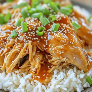 To make this dish, you will need: - 2 lbs boneless, skinless chicken thighs - 1/2 cup low-sodium soy sauce - 1/4 cup honey - 2 tablespoons gochujang (Korean red chili paste) - 3 cloves garlic, minced - 1 tablespoon fresh ginger, minced - 1 tablespoon sesame oil - 1/2 cup green onions, chopped - Salt and pepper to taste These ingredients create a tasty balance of sweet and spicy. The chicken thighs stay juicy when cooked low and slow. You can add a few garnishes for extra flavor and color: - Chopped green onions - Sesame seeds These toppings make your dish look pretty and add a nice crunch. Serve this Korean chicken with: - Steamed rice - Lettuce wraps These sides complement the dish well. They soak up the sauce and add freshness to your meal. Enjoy the mix of flavors and textures! To start, grab a bowl. Mix 1/2 cup of low-sodium soy sauce, 1/4 cup of honey, 2 tablespoons of gochujang, 3 minced garlic cloves, and 1 tablespoon of minced ginger. Add 1 tablespoon of sesame oil for that nutty flavor. Stir it all together until you see a smooth mixture. This sauce is the heart of your dish. Next, sprinkle salt and pepper on both sides of your 2 pounds of boneless chicken thighs. Place the seasoned chicken in the slow cooker. Pour the sweet and spicy sauce over the chicken. Make sure all the pieces are well coated. This step ensures that every bite is packed with flavor. Now, it’s time to cook. You can set your slow cooker to low for 6 to 7 hours or high for 3 to 4 hours. Both options work well. Just choose what fits your schedule. Your chicken will be ready when it’s tender and easy to shred. Enjoy the smell that fills your kitchen while it cooks! To make your dish just right, focus on the sauce. The mix of soy sauce, honey, and gochujang is key. Start with half a cup of soy sauce to keep it salty but not too salty. Add a quarter cup of honey for sweetness. If you want more heat, try adding an extra teaspoon of gochujang. Taste the sauce before cooking. Adjust it to fit your taste. This way, you get the perfect balance. Choose your slow cooker settings based on your schedule. If you have time, cook on low heat for six to seven hours. This makes the chicken very tender. If you are short on time, use high heat for three to four hours. Both ways work well, but low heat gives better flavor. Make sure to cover the slow cooker tightly. This keeps the heat in and helps the chicken cook evenly. Shredding chicken can be a breeze with the right tools. After cooking, let the chicken cool for a few minutes. Use two forks to shred it. Hold one fork in each hand. Pull the chicken apart gently. If you want it even easier, try using a stand mixer. Place the chicken in the bowl and mix on low speed for a minute. This saves time and gives you perfectly shredded chicken. {{image_2}} You can swap chicken thighs for other meats. Try using chicken breasts for a leaner dish. Pork is another great option. Cut pork shoulder into chunks and use it like chicken. Beef is also delicious. You can use stewing beef, which will get tender and flavorful. For a vegetarian or vegan twist, use tofu or tempeh. Press the tofu to remove excess water. Then cut it into cubes. Marinate the tofu in the sauce for extra flavor. You could also use jackfruit. This fruit has a texture similar to shredded meat. Cook it in the sauce until it soaks up the flavors. To change the heat level, you can adjust the gochujang. For less heat, use less gochujang. You can also add a bit of brown sugar to balance it out. If you want more heat, add a pinch of red pepper flakes or more gochujang. Taste the sauce before adding more spice. This way, you can find the right heat for you. To keep your sweet and spicy Korean chicken fresh, place it in an airtight container. Ensure the chicken is cool before sealing it. Store it in the fridge for up to three days. If you want to keep it longer, freezing is a great option. When you're ready to enjoy your leftovers, reheat them gently. You can use a microwave or a saucepan. If using a microwave, heat in short bursts, stirring in between. For the stovetop, warm on low heat until hot. This keeps the chicken tender and flavorful. Freezing is a smart way to save your sweet and spicy Korean chicken for later. Portion it into freezer-safe bags or containers. Label each bag with the date. It can stay in the freezer for up to three months. When you're ready to eat, thaw it overnight in the fridge before reheating. Yes, you can use chicken breasts. Chicken breasts are leaner than thighs. They may dry out more, so check them closely. I recommend cooking them on low for about 5-6 hours. This helps keep them moist. If you do not have gochujang, try sriracha or chili paste. You can mix these with some sugar. This mix can mimic the sweet and spicy taste. Remember, it may not be as rich in flavor, but it will still work well! The chicken is done when it is tender and shreds easily. You can check the internal temperature, which should reach 165°F. If you can pull it apart with a fork, it is ready. Always make sure it cooks well for safety. Yes, you can prepare this dish ahead of time. You can store the sauce and chicken in the fridge for up to two days. Just reheat it in your slow cooker before serving. This makes meal prep easy and saves time! This blog post covers how to make Slow Cooker Sweet and Spicy Korean Chicken. We talked about the main ingredients and optional toppings. I shared tips for preparing the sauce, cooking times, and tricks for shredding chicken. You can also explore variations for protein and spice levels. Lastly, I provided storage tips and answered common questions. Enjoy this dish as a tasty meal that’s easy to make. Try it out and make it your own!