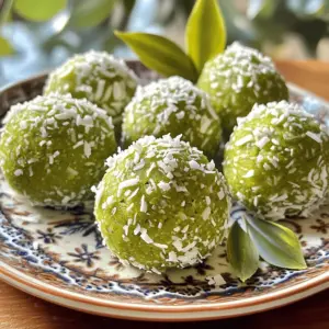 To make Matcha Coconut No Bake Energy Bites, you need: - 1 cup rolled oats - 1/2 cup almond butter (or any nut butter) - 1/4 cup honey or maple syrup - 1/4 cup shredded unsweetened coconut - 1 tablespoon matcha green tea powder - 1/4 cup mini chocolate chips (optional) - Pinch of salt - 1/4 teaspoon vanilla extract If you have nut allergies, use sunflower seed butter or pumpkin seed butter. They both work great! For sweeteners, maple syrup is a good option if you want it vegan. You can also use agave syrup for a different taste. If you want to cut sugar, try mashed bananas or dates. They add sweetness and moisture. - Rolled oats: They are rich in fiber. This helps with digestion and keeps you full. - Almond butter: This nut butter gives healthy fats and protein. It helps your body build muscle. - Honey or maple syrup: These natural sweeteners provide quick energy. They also have antioxidants. - Shredded coconut: This adds healthy fats and fiber. It can help with heart health. - Matcha green tea powder: Matcha boosts metabolism and gives you a calm alertness. It's also full of antioxidants. - Mini chocolate chips: They add flavor and can lift your mood. Use dark chocolate for added health benefits. - Salt: A small pinch can enhance flavors. It also helps balance hydration in your body. - Vanilla extract: This adds a warm flavor that makes everything taste better. It can also aid digestion. First, take a large bowl. Add 1 cup of rolled oats. Then, mix in 1/2 cup of almond butter. You can use any nut butter you like. Next, pour in 1/4 cup of honey or maple syrup. This adds sweetness. Toss in 1/4 cup of shredded coconut for texture. Now, add 1 tablespoon of matcha green tea powder. This gives a nice green color and flavor. Don’t forget a pinch of salt to enhance the taste. Finally, add 1/4 teaspoon of vanilla extract for a nice aroma. Mix all these ingredients well. You want a sticky mixture. Once the mixture is ready, wash your hands. Grab about a tablespoon of the mix. Roll it into a ball about 1 inch in diameter. Keep your hands slightly damp to help with rolling. Place the formed balls on a baking sheet. Make sure to line it with parchment paper. This will prevent sticking. Continue rolling until all the mixture is shaped into bites. You should end up with about 12 energy bites. After shaping the bites, it's time to chill them. Place the baking sheet in the fridge. Let the energy bites chill for at least 30 minutes. This helps them firm up nicely. Once set, transfer the bites to an airtight container. You can store them in the refrigerator. They should last up to 2 weeks. Enjoy these tasty bites whenever you need a quick snack! To get the best texture, balance is key. You want your bites to be chewy but firm. If they feel too dry, add more almond butter. If too wet, mix in a bit more oats. This helps hold everything together. You can boost the flavor easily. Try adding a dash of cinnamon or nutmeg. You can also fold in dried fruits like cranberries or apricots for a sweet twist. If you love chocolate, mini chocolate chips add a fun touch. One big mistake is not chilling long enough. Let the bites sit for at least 30 minutes. This helps them firm up nicely. Another error is not mixing well. Make sure everything is combined before rolling into balls. Lastly, don’t skip the pinch of salt; it enhances all the flavors. {{image_2}} You can make these energy bites vegan easily! Simply swap the honey for maple syrup. This sweetener is perfect for plant-based diets. All other ingredients are already vegan-friendly. Enjoy the same great taste without any animal products! Want to change things up? You can add many mix-ins to these bites. Try dried fruits like cranberries or apricots for sweetness. You can also use seeds like chia or flax for extra crunch. If you love chocolate, add more mini chocolate chips or even cacao nibs. Each mix-in gives a new twist to the flavor! If you have nut allergies, no worries! You can use sunflower seed butter instead of almond butter. This option keeps the bites creamy and tasty. Always check labels to ensure no hidden nuts are in your ingredients. Enjoy these bites safely without nuts! Store your Matcha Coconut No Bake Energy Bites in an airtight container. This keeps them fresh. I recommend placing a piece of parchment paper between layers if you stack them. It prevents them from sticking together. These bites stay good in the fridge for up to two weeks. If you want them to last longer, freezing is a great option. To freeze, place the energy bites on a baking sheet. Make sure they're not touching each other. Freeze them for about an hour until firm. Once frozen, transfer them to a freezer-safe bag. They can last up to three months in the freezer. When you want one, just take it out and let it thaw a few minutes at room temperature. Check for any off smells or changes in color. If the bites feel sticky or have an unusual texture, it’s best to toss them. If you see any mold, do not eat them. Always trust your senses. Keeping your energy bites stored well helps you enjoy them longer! These energy bites last for up to two weeks in the fridge. Store them in an airtight container. Keeping them chilled helps maintain their freshness and flavor. Yes, you can make them gluten-free. Just use certified gluten-free oats. This way, you avoid any gluten cross-contamination while still enjoying a tasty treat. Matcha offers many health benefits. It is rich in antioxidants, which help fight free radicals. Matcha can boost energy and enhance focus. It also supports metabolism and promotes relaxation. Absolutely! These energy bites are great for kids. They are packed with nutrients and offer a tasty snack. Just keep an eye on any nut allergies when serving to children. Yes, you can use any nut butter you like. Peanut butter, cashew butter, or sunflower seed butter all work well. Just remember that each nut butter has its own unique flavor. Choose one your family enjoys! These energy bites are easy to make and full of flavor. We covered the best ingredients, substitutes, and health benefits. I shared clear steps for preparation, forming, and storing your bites. Plus, I highlighted tips for texture and flavor. You can easily create variations for different diets or preferences. Remember to store them properly to keep them fresh. With these tools, you can enjoy tasty and healthy snacks anytime. I hope you try making them soon!