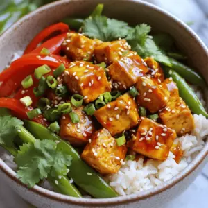 - 1 block (14 oz) firm tofu, drained and pressed - 1 red bell pepper, sliced - 1 cup snap peas, trimmed - 2 green onions, chopped (white and green parts separated) - 3 cloves garlic, minced - 1 tablespoon fresh ginger, minced - 3 tablespoons Szechuan chili paste - 2 tablespoons soy sauce - 1 tablespoon rice vinegar - 1 tablespoon sesame oil - 1 teaspoon sugar - Sesame seeds - Fresh cilantro To make Spicy Szechuan Tofu Bowls, you need a few key ingredients. Start with firm tofu. It holds its shape well and absorbs flavors. Fresh veggies add color and crunch. I love using red bell pepper and snap peas for this dish. Next, you’ll need aromatics. Garlic and ginger give a strong base. Green onions add a nice bite. They make the dish pop! For the sauce, Szechuan chili paste is a must. It gives the dish its signature spicy kick. Soy sauce adds saltiness, while rice vinegar adds tang. Sesame oil brings richness, and sugar balances the heat. Don’t forget the garnishes! Sesame seeds and fresh cilantro add a nice touch. They make the dish look pretty and add extra flavor. Enjoy your cooking! To start, you need to press the tofu. This removes excess water and helps it crisp up. Wrap the tofu in a clean towel. Place a heavy object on top. Let it sit for 15-30 minutes. Next, cut the pressed tofu into 1-inch cubes. This size helps it cook evenly and soak up all the flavors. For a golden texture, make sure your skillet is hot enough. Too cool, and the tofu will stick. Heat 2 tablespoons of vegetable oil in a large skillet over medium-high heat. Once the oil shimmers, add the tofu cubes. Fry them for 8-10 minutes. You want them golden brown on all sides. Remove the tofu and set it aside. In the same skillet, add sliced red bell pepper, snap peas, and the white parts of the green onions. Stir-fry for 3-4 minutes. You want them tender but still crisp. Then, add minced garlic and ginger. Stir-fry for another minute. This step brings out their flavors. Now it's time to add the sauces. Return the tofu to the skillet. Pour in 3 tablespoons of Szechuan chili paste, 2 tablespoons of soy sauce, 1 tablespoon of rice vinegar, 1 tablespoon of sesame oil, and 1 teaspoon of sugar. Toss everything well. Make sure the sauce coats the tofu and vegetables evenly. Cook for an additional 2-3 minutes to heat through. Serving this hot over jasmine rice is key. It soaks up the flavors! Garnish with green parts of green onions, sesame seeds, and fresh cilantro for a bright finish. Enjoy your spicy Szechuan tofu bowls! Tofu can easily become soggy if not prepared right. Here’s how to avoid that. First, always drain and press your tofu. This removes excess moisture. Cut it into 1-inch cubes for even cooking. For a crispy texture, use high heat. I recommend using vegetable oil in a hot skillet. Cook the tofu until golden brown on all sides. This usually takes about 8 to 10 minutes. You can remove the tofu and set it aside to keep it crispy. Do you want to adjust the heat? Start by changing the amount of Szechuan chili paste. If you like it spicy, stick to the recipe. For a milder dish, use less paste. You can also add a bit of honey or sugar to balance the heat. If you prefer a different flavor, try using a sweet chili sauce. It gives a nice taste without too much spice. What rice should you serve with your bowls? Jasmine rice pairs best with this dish. Its fragrant flavor complements the spicy tofu. For side dishes, consider serving a simple cucumber salad. It adds freshness and crunch. You could also try steamed broccoli or bok choy for extra veggies. {{image_2}} You can easily switch out tofu for other proteins. Tempeh, seitan, or chickpeas work well. Each option adds its own unique taste. You can also add more vegetables. Try broccoli, carrots, or bok choy. This not only boosts flavor but also adds more nutrients. If you need gluten-free options, look for gluten-free soy sauce. Many brands offer great taste without gluten. You can also explore alternative sauces, like coconut aminos. This gives a sweet and salty flavor without the gluten. To kick up the flavor, add extra spices or herbs. Consider crushed red pepper or fresh basil. These small changes can create a big impact. You can also try a twist on classic Szechuan flavors. Add some lime juice or peanuts for a new taste. This keeps the dish exciting and fresh. To enjoy your spicy Szechuan tofu bowls later, store them in an airtight container. This keeps the flavors fresh. Place the bowls in the fridge within two hours of cooking. This helps avoid bacteria growth. To prevent sogginess, separate the tofu from the rice and veggies. Store each part in its own container. This way, the tofu stays crisp when you reheat it. When you’re ready to enjoy your leftovers, you have a few good options. The best way to reheat tofu bowls is in a skillet. Heat a little oil over medium heat. Add the tofu and veggies, stirring often until warm. You can also use a microwave. Place the tofu bowl in a microwave-safe dish. Cover it with a damp paper towel. Heat in short bursts, checking often. This keeps the moisture in and the tofu tender. If you want to save your spicy Szechuan tofu bowls for later, freezing is a great choice. First, let the dish cool completely. Then, place it in a freezer-safe container. Make sure to leave some space for expansion. To thaw, move the bowl to the fridge overnight. For a quick method, use the microwave on defrost mode. This helps keep the texture of the tofu. When reheating, follow the same steps as before to keep everything tasty. Yes, you can use frozen tofu. Frozen tofu has a different texture. It becomes spongy and absorbs more sauce. To use it, thaw the tofu completely. Press it to remove extra water. Then, cut it into cubes and cook as normal. You may need to adjust cooking times since it may take longer to fry. Spicy Szechuan Tofu Bowls can last about 3 to 4 days in the fridge. Store them in an airtight container. Look for signs of spoilage like a sour smell or mold. If the tofu becomes slimy, it’s best to discard it. If you don’t have Szechuan chili paste, try using a mix of chili garlic sauce and soy sauce. You can also use sambal oelek or a hot sauce of your choice. Adjust the amount based on your spice preference. If you want less heat, add more soy sauce or a bit of honey for sweetness. In this post, we explored making Spicy Szechuan Tofu Bowls. You learned about key ingredients like tofu, fresh veggies, and aromatic spices. I shared step-by-step instructions to get perfect textures and flavors. Customize your dish to your taste with tips for spice levels and serving ideas. Remember, you can store leftovers and reheat them to enjoy later. Embrace creativity in the kitchen and make this dish your own! Enjoy cooking and delighting in each bite.