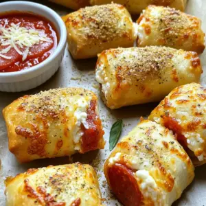 - 1 cup shredded mozzarella cheese - 1/2 cup pepperoni slices (or favorite topping) - 1/2 cup ricotta cheese - 1 teaspoon Italian seasoning - 1/2 cup marinara sauce (for dipping) - 8-10 egg roll wrappers - Olive oil spray - Grated Parmesan cheese (optional, for extra flavor) To make crispy air fryer pizza rolls, you need to gather some tasty ingredients. First, grab 1 cup of shredded mozzarella cheese. This cheese melts well and gives a great stretch. Next, you’ll want 1/2 cup of pepperoni slices or any topping you like. You can use vegetables or other meats too. Next, take 1/2 cup of ricotta cheese. This adds a creamy texture and balances the flavors. For seasoning, use 1 teaspoon of Italian seasoning. This mix will give your rolls that classic pizza taste. Don’t forget to have 1/2 cup of marinara sauce ready for dipping. It adds nice flavor when you eat your rolls. You will also need 8-10 egg roll wrappers. These hold everything together and crisp up nicely. For a golden finish, grab some olive oil spray. Lastly, if you want to elevate the taste, sprinkle some grated Parmesan cheese on top. This is optional but highly recommended! With these ingredients, you’re all set to make a delicious snack that everyone will love. First, mix the cheese and toppings in a bowl. Use 1 cup of shredded mozzarella, 1/2 cup of ricotta, and 1/2 cup of pepperoni slices. You can add any favorite topping here. Add 1 teaspoon of Italian seasoning. This adds great flavor to your filling. Mix everything well until it combines smoothly. Now, let’s assemble the pizza rolls. Take an egg roll wrapper and lay it flat. Position it so one corner points towards you. Place about 2 tablespoons of the cheese mixture in the center of the wrapper. Moisten the edges with a bit of water to help seal it. Fold the bottom corner over the filling. Next, fold in the sides and roll it tightly. Make sure it’s sealed well. Repeat this with the rest of the wrappers and filling. Before cooking, preheat the air fryer to 375°F (190°C) for about 5 minutes. This step helps the pizza rolls cook evenly. Lightly spray the rolls with olive oil. This helps them get crispy. Place the rolls in a single layer in the air fryer basket. Cook them for 8-10 minutes. Turn them halfway through for even browning. They should be golden brown and crispy when done. Enjoy them hot! To get those pizza rolls nice and crispy, use olive oil spray. A light, even coat helps them brown well. Hold the spray about 6 inches away. This distance makes sure the oil covers each roll evenly. When you place the rolls in the air fryer, arrange them in a single layer. This allows hot air to flow all around each roll. If you stack them, they won’t cook evenly. For best results, don’t overcrowd the basket. Cook in batches if needed. While marinara sauce is a classic, you can switch it up. Try ranch dressing for a creamy twist. Garlic butter also pairs well with the crispy rolls. For something different, give barbecue sauce a shot. Each option adds fun flavors to your snack! Don’t forget about spicy options. Hot sauce or sriracha can add a kick. You can even mix marinara with crushed red pepper for heat. The right dip can change the whole experience! {{image_2}} You can change the cheese in your pizza rolls. Try adding cheddar or gouda for rich flavors. These cheeses melt well and add a nice texture. You can also mix in spices to boost the taste. Italian herbs like oregano or basil work great. A pinch of garlic powder can also make them pop! Want a lighter snack? Use veggies like spinach or mushrooms as a filling. You can add bell peppers or zucchini for extra crunch. For meat lovers, try using cooked sausage or chicken. These swaps help everyone enjoy pizza rolls their way. Get creative and make your rolls unique! To keep your leftover pizza rolls fresh, place them in an airtight container. This will prevent them from drying out in the fridge. Store them in the refrigerator for up to three days. If you want to save them for later, freezing is a great option. Wrap each roll tightly in plastic wrap and place them in a freezer bag. They can last up to two months in the freezer. The best way to reheat pizza rolls is in the air fryer. Set it to 375°F (190°C). Cook for about 5 minutes or until they are hot and crispy again. This method helps to keep that delightful crunch. If you don’t have an air fryer, you can use an oven. Preheat the oven to 375°F (190°C) and place the pizza rolls on a baking sheet. Heat for about 10-12 minutes. You can also microwave them, but be aware that this may make them a bit soggy. If you choose this method, heat them for 30 seconds at a time until warm. Yes, you can use different wrappers for your pizza rolls. If you're gluten-free, try rice paper wrappers. They work well and stay crispy. You can also use tortilla wraps for a different texture. Both options give you a tasty twist on the classic egg roll wrapper. To keep your pizza rolls crispy, store them in a container that allows air flow. Avoid tight lids. You can also place a paper towel inside the container. This absorbs extra moisture. If you must reheat, use the air fryer. This helps restore that crispiness you love. The best toppings are ones you love! Popular choices include pepperoni, mushrooms, and bell peppers. You can also add olives or spinach for a veggie boost. Mix and match to find your favorite combo. Don't forget to season with Italian herbs for extra flavor! In this post, we explored how to make tasty air fryer pizza rolls. You learned about the key ingredients, like mozzarella and pepperoni, and how to prepare the filling. We covered assembling the rolls and cooking them to perfection. Remember to spray with olive oil for crispiness and try different toppings. Store leftovers properly and reheat in the air fryer for the best results. Whether you stick to traditional recipes or experiment, these pizza rolls will surely please your taste buds. Enjoy your cooking!