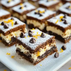 To make Cannoli Cookie Squares, you need the right ingredients. Gather these tasty items to create this dessert: - 1 cup all-purpose flour - 1/2 cup unsweetened cocoa powder - 1/2 cup granulated sugar - 1/2 teaspoon baking powder - 1/4 teaspoon salt - 1/2 cup unsalted butter, softened - 1 large egg - 1 teaspoon vanilla extract - 1 cup ricotta cheese - 1/4 cup powdered sugar - 1 teaspoon vanilla extract (for filling) - 1/4 cup mini chocolate chips - Zest of 1 orange (optional) - 1/4 teaspoon ground cinnamon (optional) Each ingredient plays a key role in making these squares special. The flour and cocoa powder form the rich base. Sugar gives the right sweetness. Baking powder helps the cookie rise, while salt balances the flavors. The butter adds creaminess, and the egg binds everything together. Vanilla and ricotta cheese create a smooth filling. Mini chocolate chips add a fun crunch, and orange zest can brighten the flavor. You can also customize the recipe by adding cinnamon or using different toppings. Enjoy making your Cannoli Cookie Squares! {{ingredient_image_1}} First, preheat your oven to 350°F (175°C). This is the ideal temperature for baking. While it heats up, grease a 9x9-inch baking pan. You can also line it with parchment paper for easy removal. Next, let’s make the cookie base. In a mixing bowl, combine the following dry ingredients: - 1 cup all-purpose flour - 1/2 cup unsweetened cocoa powder - 1/2 cup granulated sugar - 1/2 teaspoon baking powder - 1/4 teaspoon salt Whisk them together until they mix well. In a separate bowl, cream 1/2 cup softened butter until it looks fluffy. Then add 1 large egg and 1 teaspoon vanilla extract. Mix until smooth. Now, add the dry ingredients to the wet ingredients slowly. Stir until a dough forms. This dough will be your cookie base. Take about 2/3 of the dough and press it evenly into the bottom of the prepared baking pan. Don’t forget to keep the remaining dough for the topping. For the filling, mix these ingredients in a bowl: - 1 cup ricotta cheese - 1/4 cup powdered sugar - 1 teaspoon vanilla extract (for filling) - 1/4 cup mini chocolate chips - Zest of 1 orange (optional) Mix until everything is combined. Then evenly spread this ricotta mixture over the cookie base. Next, crumble the reserved dough over the filling. This will create a nice crumble topping. Now, place your pan in the oven. Bake for 25-30 minutes. The top should feel set and slightly firm when done. After baking, let the squares cool in the pan for 10 minutes. Then transfer them to a wire rack to cool completely. This step is key before slicing into squares. You may want to switch some ingredients. Here are a few ideas: - Flour: Use whole wheat flour for a nuttier taste. - Cocoa Powder: Dutch-process cocoa gives a milder flavor. - Butter: Try coconut oil for a dairy-free option. - Ricotta Cheese: Cottage cheese can work too; just blend it smooth. - Sugar: Substitute with honey or maple syrup for a natural sweetener. Make these squares look fancy! Here are some fun ways: - Dust with Powdered Sugar: This adds a nice touch. Use a sieve for an even layer. - Serve with Berries: Place fresh strawberries or blueberries on the side. They add color and taste. - Garnish with Mint Leaves: A few mint leaves can make your dish pop. Keep these tips in mind for the best results: - Dough Consistency: Make sure your dough is not too wet or dry. It should hold together but not stick to your hands. - Baking Time: Check your squares at 25 minutes. They should feel firm but not hard. - Cooling Time: Let them cool properly before slicing. This helps the squares hold their shape. Pro Tips Use Fresh Ricotta: For the best flavor, opt for fresh ricotta cheese instead of the pre-packaged varieties. This will make a noticeable difference in your filling's taste and texture. Chill the Dough: If your dough becomes too sticky while handling, chill it in the refrigerator for about 15 minutes. This will make it easier to work with and help it maintain its shape during baking. Experiment with Flavors: Don't hesitate to add different flavorings to the ricotta filling, such as almond extract or a splash of your favorite liqueur, to create a unique twist on the classic cannoli flavor. Store Properly: To keep the cookie squares fresh, store them in an airtight container at room temperature for up to three days or refrigerate them for longer freshness. {{image_2}} You can change the filling for your Cannoli Cookie Squares to make them unique. Here are some ideas: - Adding different extracts: You can use almond extract or lemon extract for new flavors. Just add a teaspoon to the ricotta mixture. - Using ricotta alternatives or mix-ins: Try mascarpone cheese for a richer taste. You can also mix in crushed pistachios or toasted almonds for crunch. Adapting recipes can help everyone enjoy these squares. Here are some options: - Gluten-free alternatives: Use almond flour or a gluten-free all-purpose blend instead of regular flour. This keeps the texture nice and light. - Vegan options: Replace butter with coconut oil and the egg with flaxseed meal mixed with water. Use a plant-based ricotta or tofu for the filling. You can add seasonal flavors to your Cannoli Cookie Squares. Here are some fun ideas: - Incorporating seasonal fruits or spices: In the fall, add some diced apples and cinnamon. In summer, mix in fresh berries or lemon zest for a bright taste. Store any leftover Cannoli Cookie Squares in an airtight container. This keeps them fresh. You can keep them at room temperature for up to two days. If you want them to last longer, put them in the fridge. This will keep them good for about a week. Use a glass or plastic container with a tight lid. Avoid metal containers since they can cause the cookie squares to dry out. You can freeze Cannoli Cookie Squares to enjoy later. First, let them cool completely. Then, cut them into squares. Place a piece of parchment paper between the squares to prevent them from sticking. Put the squares in a freezer-safe container or bag. Make sure to remove as much air as possible. For best results, eat them within three months. To thaw the squares, take them out of the freezer. Leave them in the fridge overnight. If you need them faster, you can leave them at room temperature for a couple of hours. Enjoy your delicious treat whenever you like! To cut the squares neatly, use a sharp knife. Make sure the squares are cool. Wipe the knife with a damp cloth between cuts. This helps reduce sticking. Try to cut straight down for even edges. You can also use a ruler to measure and guide your cuts. Yes, you can make Cannoli Cookie Squares ahead of time. Bake and cool them completely. Wrap them tightly in plastic wrap. Store them in the fridge for up to three days. For longer storage, freeze them. They can last for up to three months frozen. Just thaw them in the fridge before serving. These treats are best enjoyed fresh. However, they will stay good for up to three days in the fridge. Make sure to cover them well. If frozen, they can last for about three months. When ready to eat, thaw them in the fridge overnight. Absolutely! You can add many fun toppings. Try sprinkling more mini chocolate chips on top. Or, use crushed nuts for a crunchy texture. Shredded coconut can also add flavor. For a zesty twist, consider a drizzle of orange glaze. Don't be afraid to get creative! Making Cannoli Cookie Squares is simple with the right ingredients and steps. We covered everything from gathering your supplies to baking and storage. You now know how to mix, bake, and enjoy these treats. Remember to try out different flavors and toppings for fun twists. Storing leftovers properly will keep them fresh for later. Enjoy baking and sharing these delicious squares with friends and family!